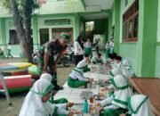 Babinsa Kodim Lamongan Setia Dampingi Langkah Kebaikan: Makan Bergizi Gratis Untuk Generasi Emas Sugio
