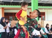 TMMD ke 129 Bojonegoro Pererat Kemanunggalan, Prada Risqi Bermain Bersama Anak-anak Kesongo