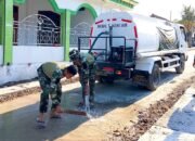 TMMD Bojonegoro: Jalan Cor Disiram, Debu di Depan Masjid Dikurangi